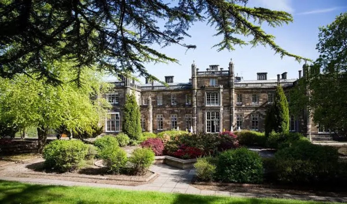 Mar Hall, a baronial mansion, seen across its gardens